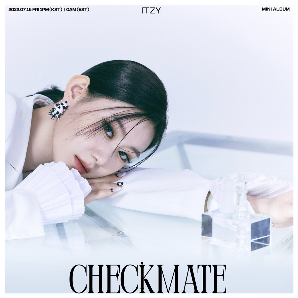 ITZY has released a new album cover for 'CHECKMATE,' after fans