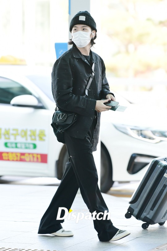 V, Suga of BTS are seen leaving Incheon International Airport on