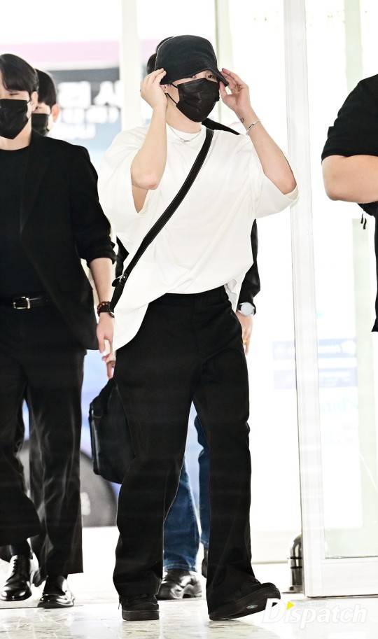 BTS' Jimin poses at airport before departure