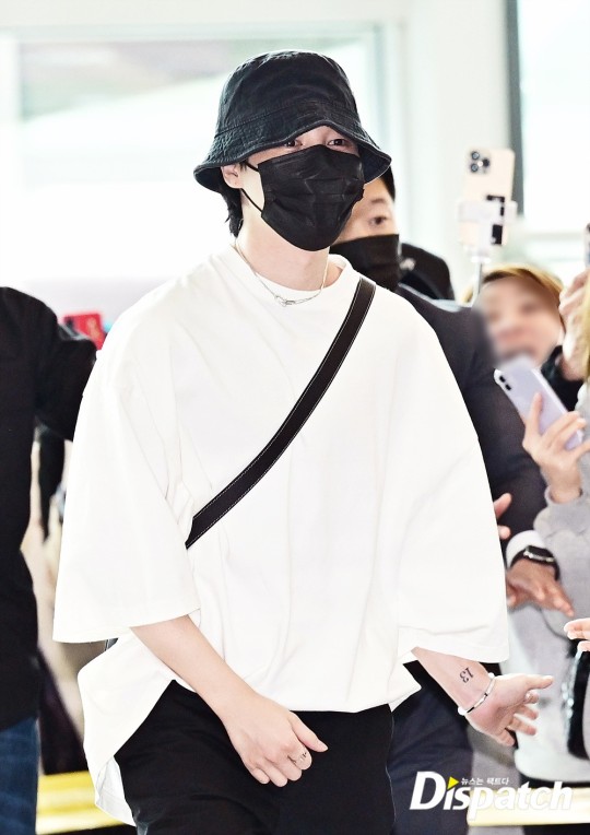 BTS' Jimin poses at airport before departure